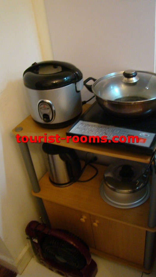 FRYING PAN AND COOKING EQUIPMENT INSIDE ONE ADRIATICO PLACE CONDOMINIUM APARTMENT IN MALATE MANILA