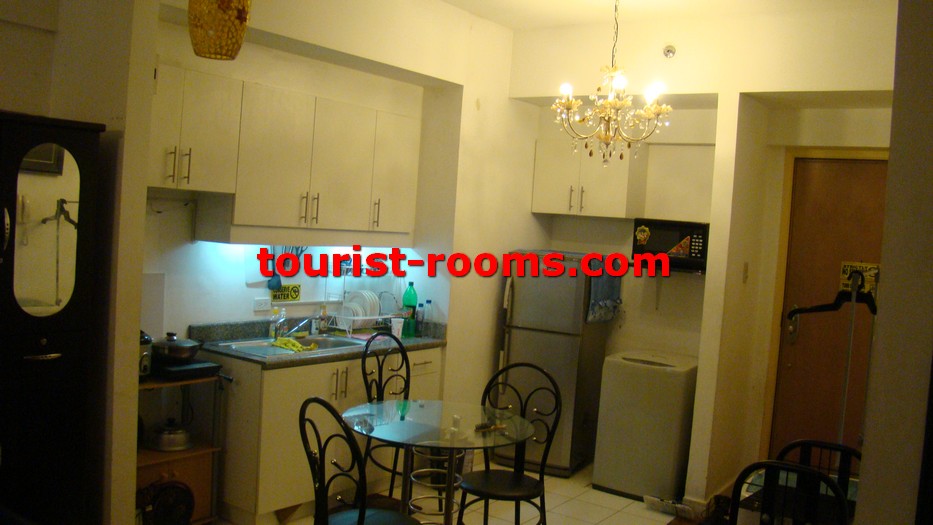 COOKING KITCHEN AREA OF ONE ADRIATICO PLACE CONDOMINIUM APARTMENT IN MALATE MANILA