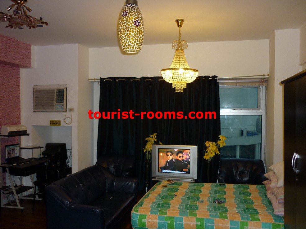 LIVING AREA PLACE AT ONE ADRIATICO PLACE CONDOMINIUM APARTMENT IN MALATE MANILA