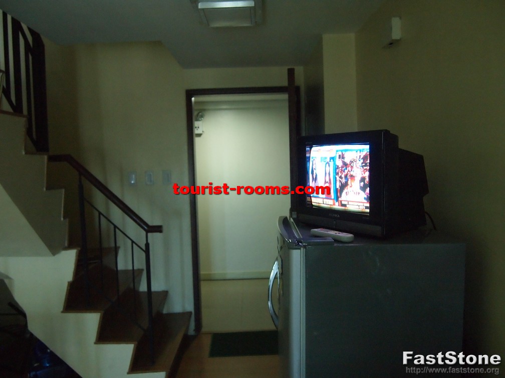 TV,FRIDGE AND STAIRCASE AT GATEWAY GARDEN HEIGHTS,GATEWAY GARDEN HEIGHTS,MANILA APARTMENTS FOR RENT,APARTMENT NEAR BONI MRT STATION FOR RENT,APARTMENT NEAR FORUM ROBINSONS MALL FOR RENT,APARTMENT AT MANDALUYONG FOR RENT,MANDALUYONG APARTMENT,MANDALUYONG APARTMENT FOR RENT