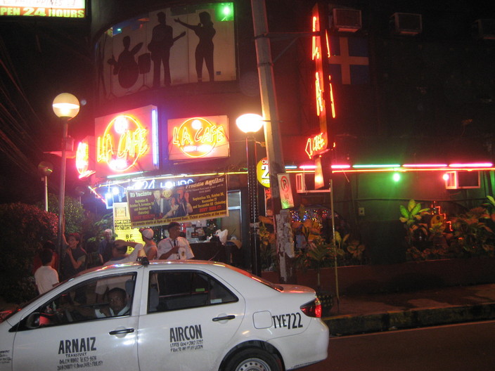 MANILA BAY CAFE WHICH IS ORIGINALLY CALLED LA CAFE IS A GOOD PLACE TO GO EAT AND HAVE A DRINK AND WATCH PEOPLE  WHILE LISTENING TO MUSIC IF YOU CANNOT SLEEP LATE AT NIGHT