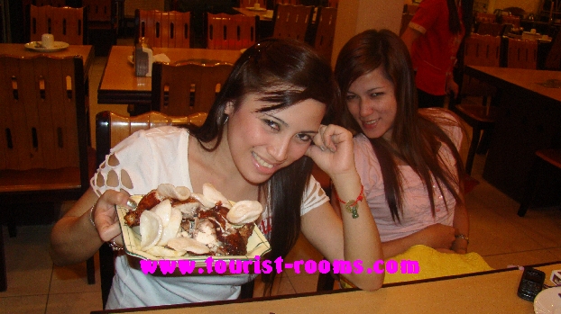 EATING DELICIOUS CRACKERS AND CHICKEN AT RESTAURANT AT MALATE MANILA